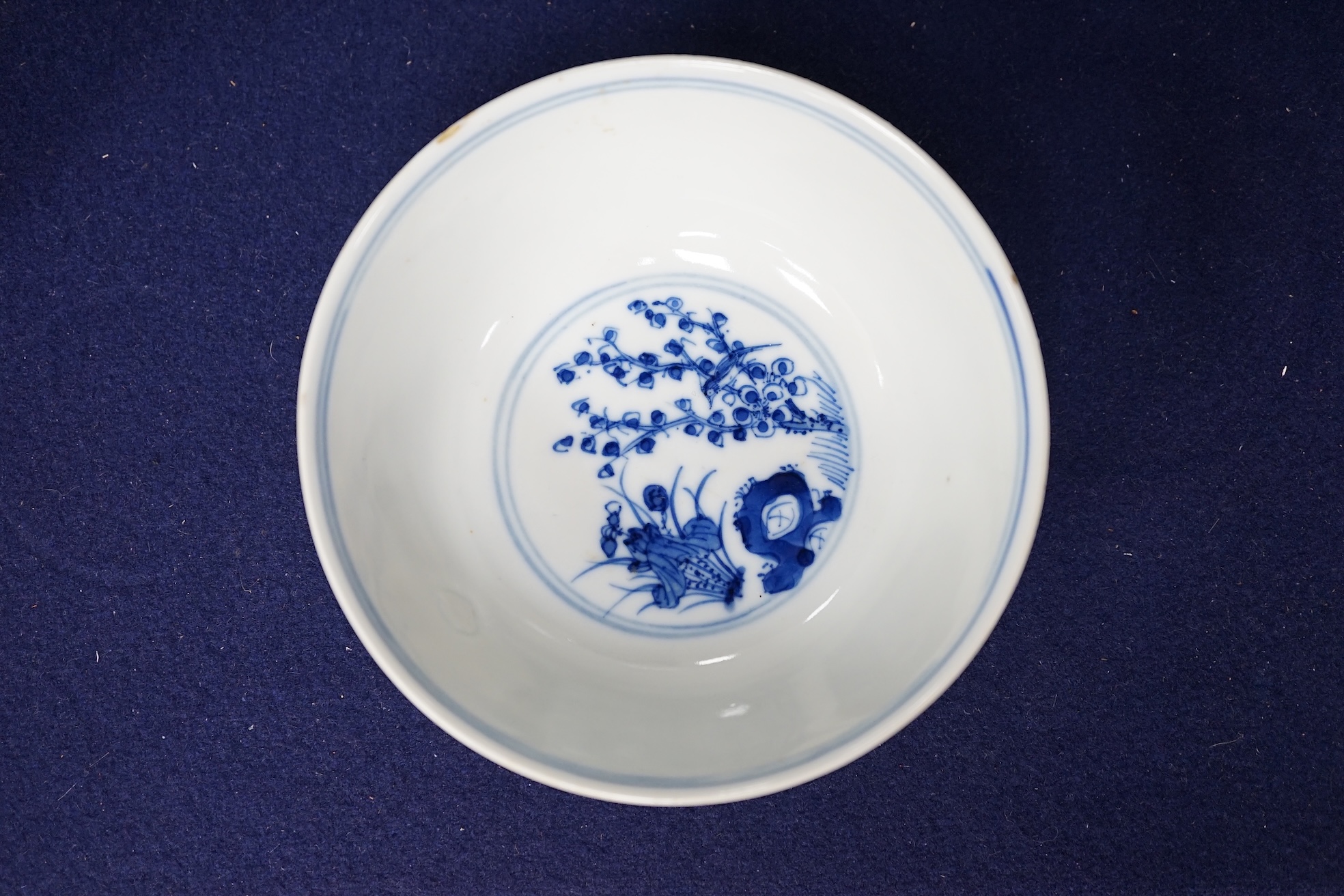 A Chinese blue and white ‘dragon’ bowl, Qianlong mark but 19th century, 12.5cm diameter. Condition - overglazed imperfection